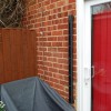 Solar Powered Wireless Balcony & Patio Door Alarm Beams  (mounted on a brick wall).