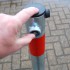 Locking the 610G with Red Band Spigot Based Fold Down Parking Post